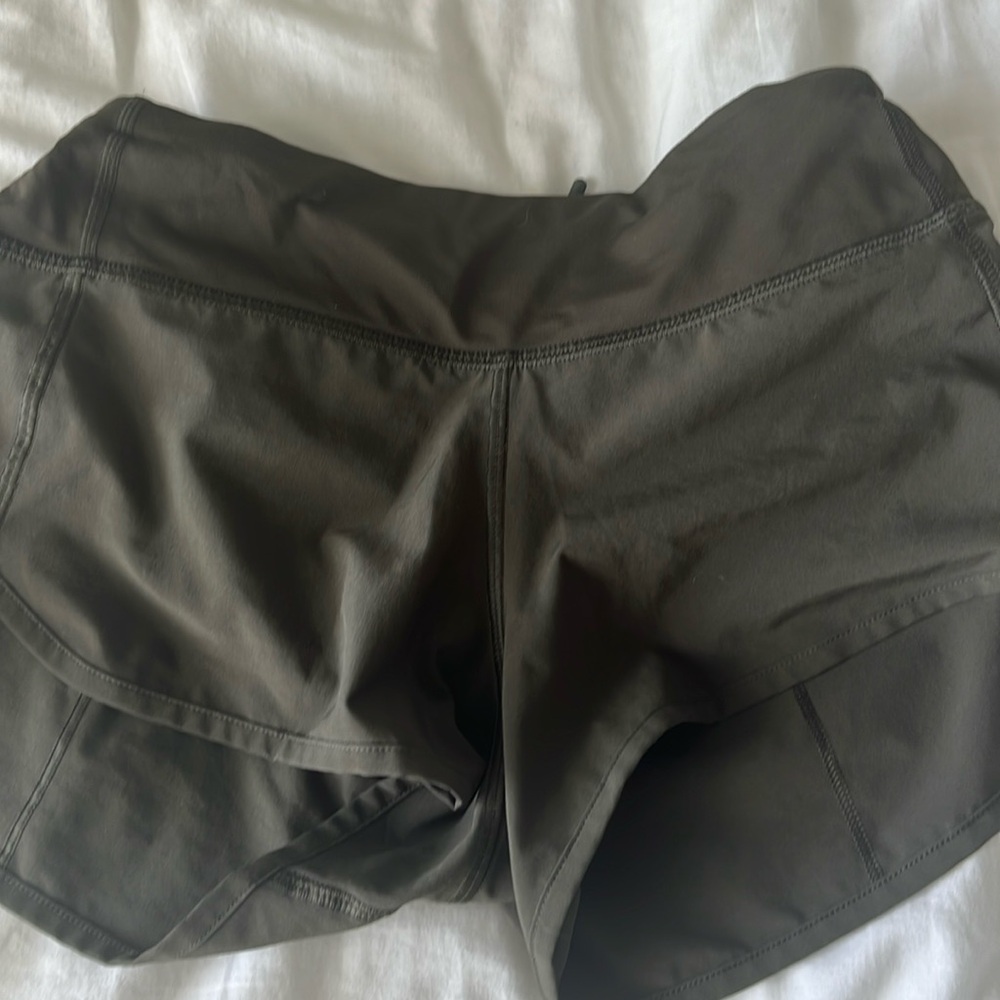 Army green lululemon shorts size 0 with a tuck on the sides